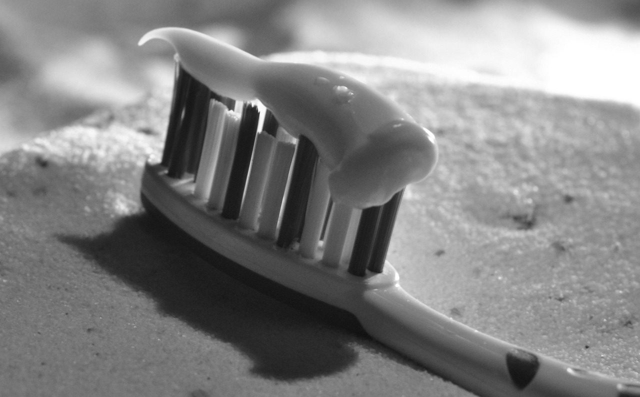 close-up of toothbrush and toothpaste